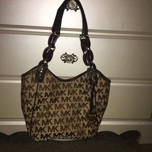 tan Michael Kors purse. 8/10 condition